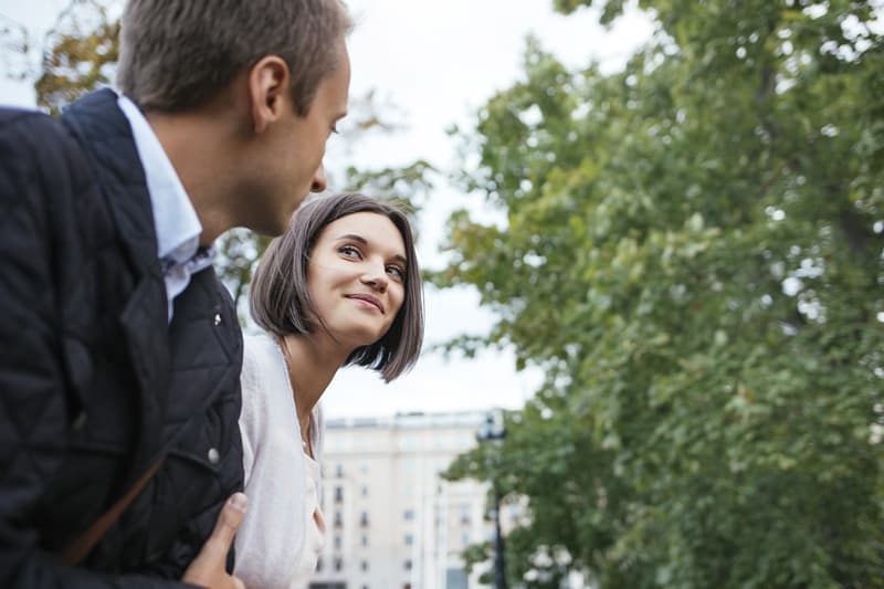 woman smiling looking at her man
