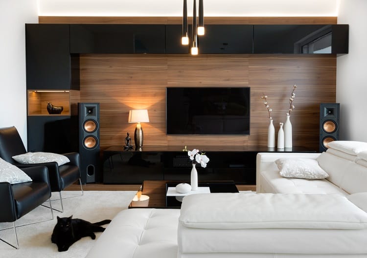 wood black wall unit tv speakers white sofa black accent chairs