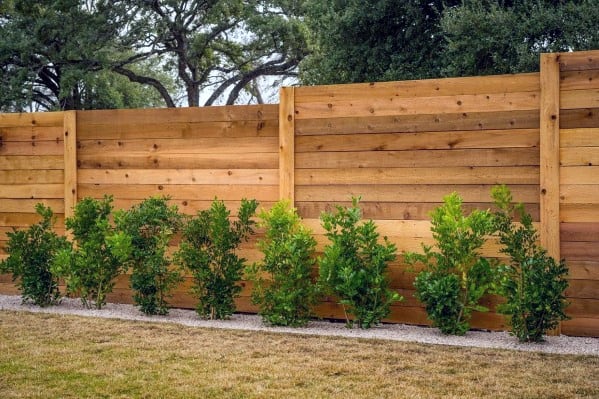 wood board privacy fence backyard