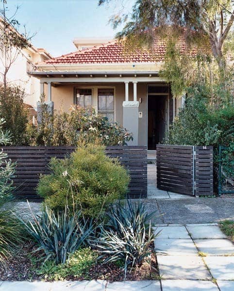 simple wood slat front yard fence 