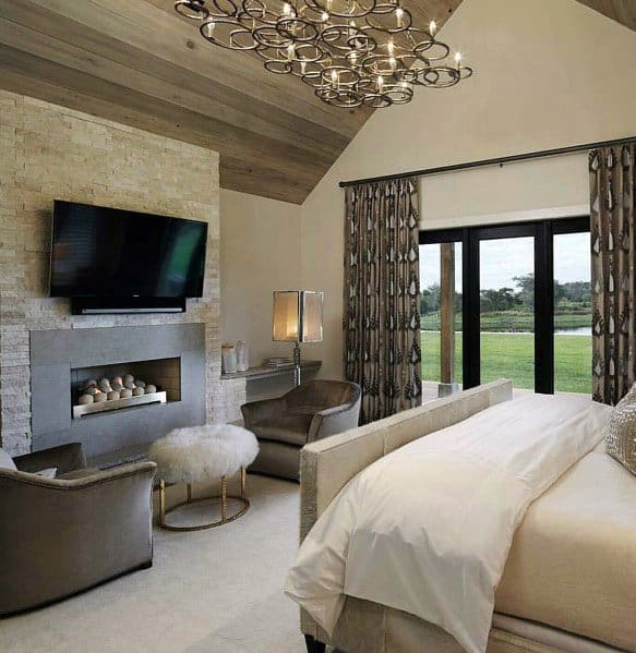 wood ceiling fireplace master bedroom