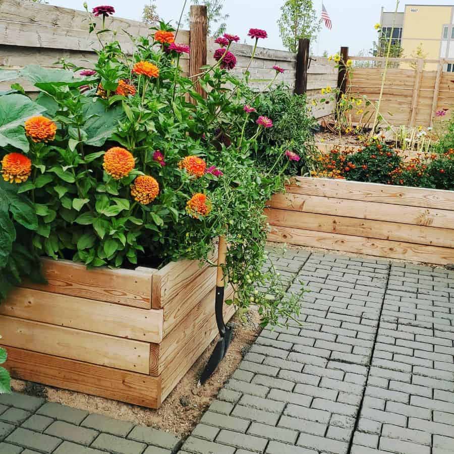 wood flower bed colorful flowers