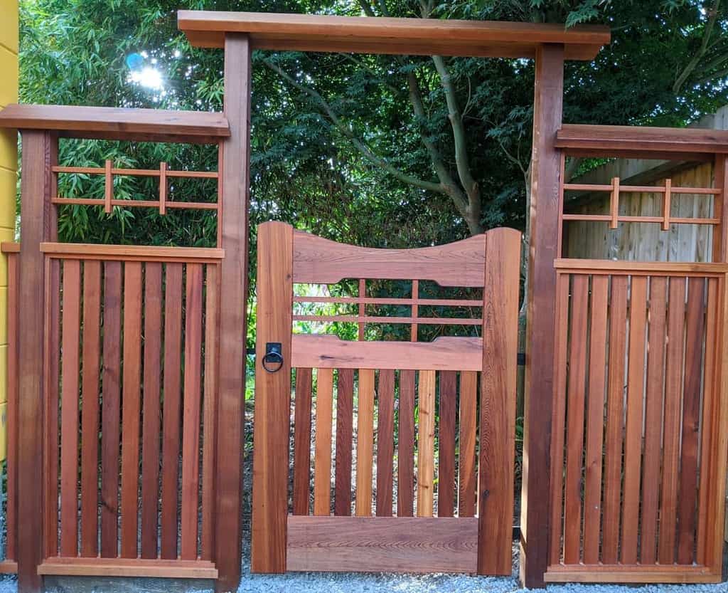 asian inspired stained wood garden gate and fence