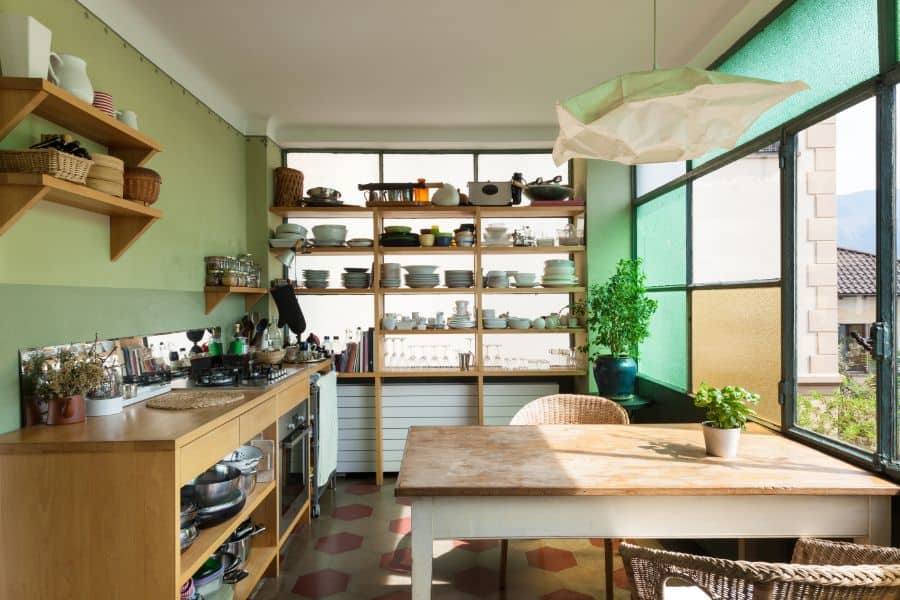green accent wall country style kitchen