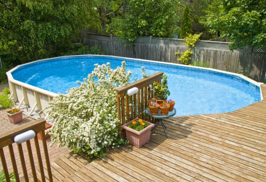 above-ground pool with wood deck