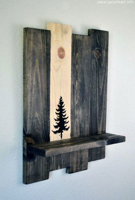 Wooden wall shelf with a carved tree design in the center panel