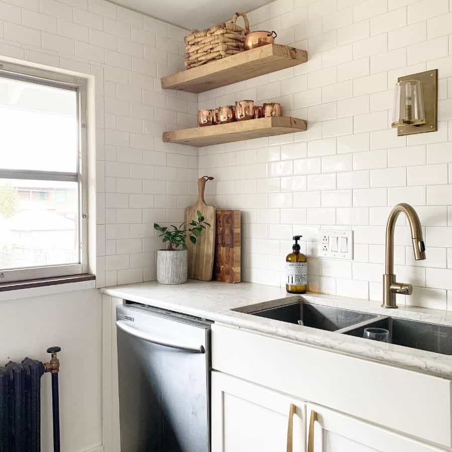 white tile kitchen wood floating wall shelves sconces lighting
