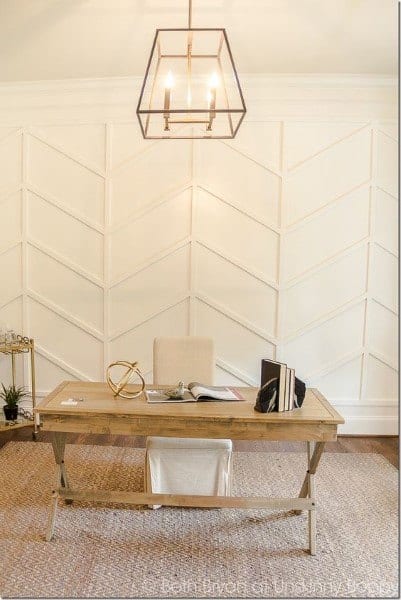 wood desk white wainscot wall paneling
