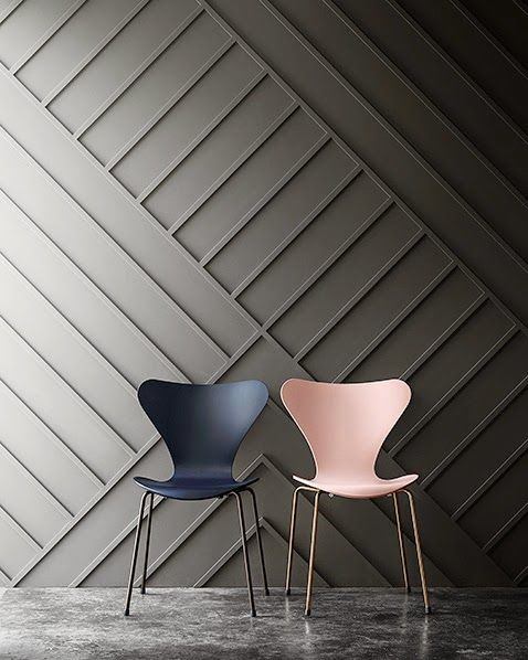 gray wood wainscoting blue and pink chairs