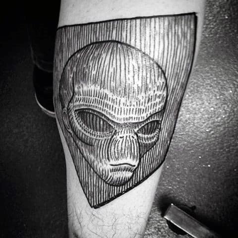 Woodcut Male Alien Head Arm Tattoos