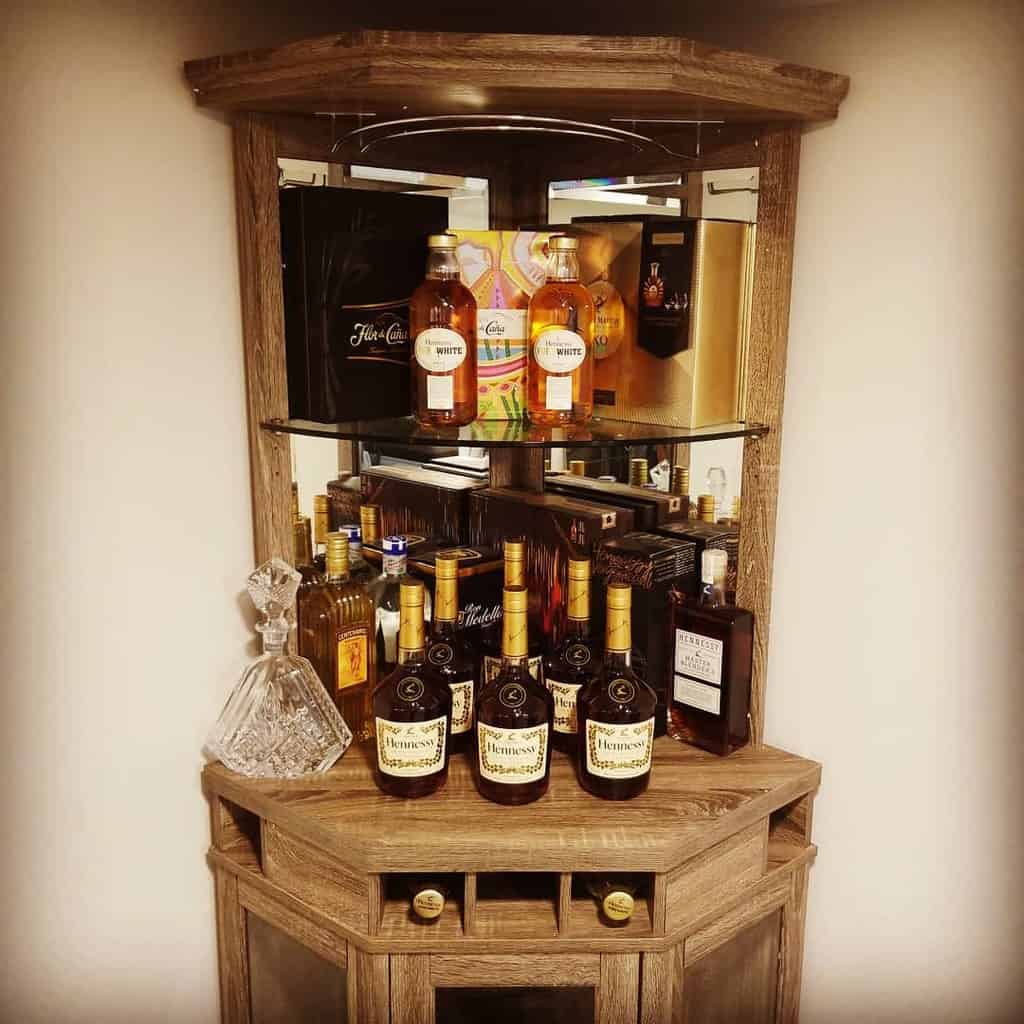 wooden liquor cabinet whiskey bottles