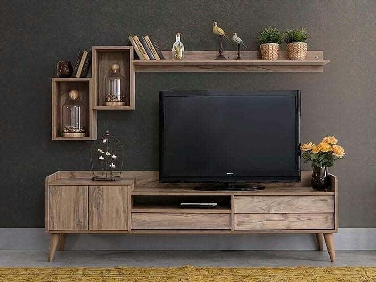 wooden media unit with tv mustard rug