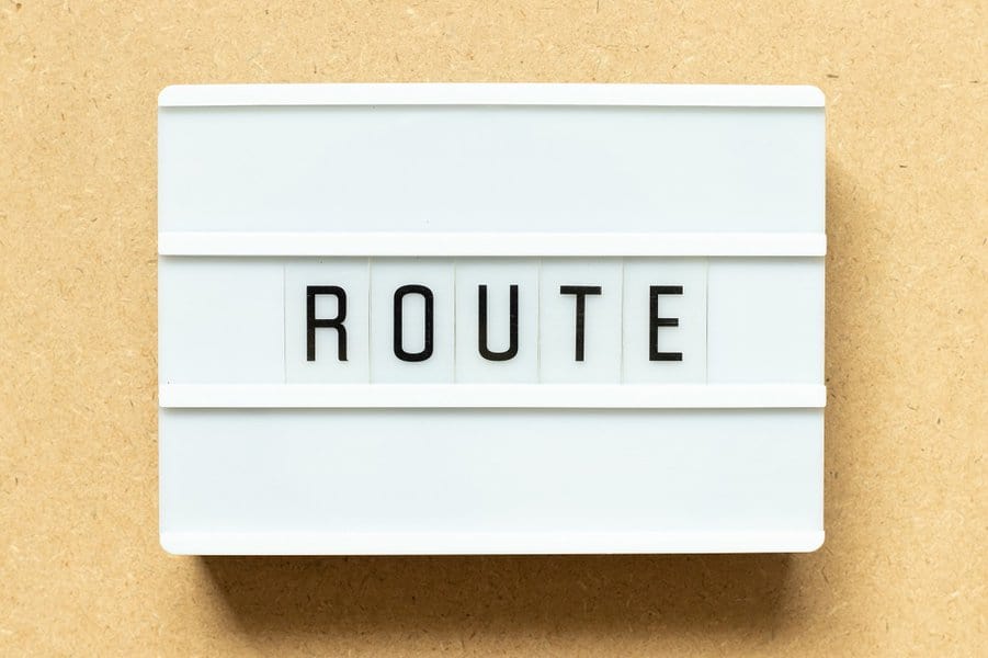 word route on wood background