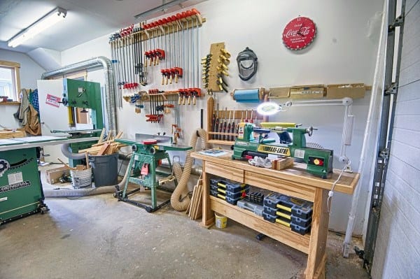 white wall workshop tools cement floor saw