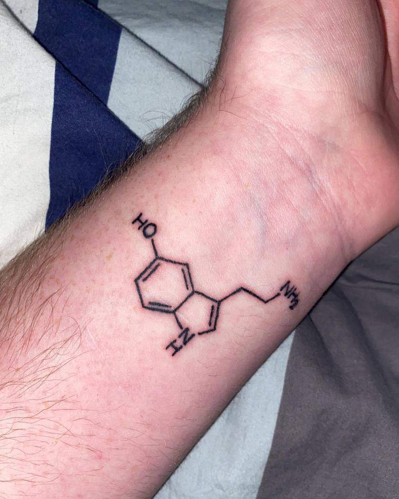 Tattoo of serotonin molecule on a wrist