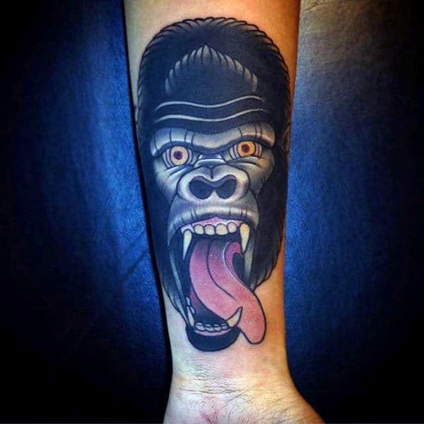 Wrist Male Gorilla Tattoo With Red Tounge Sticking Out