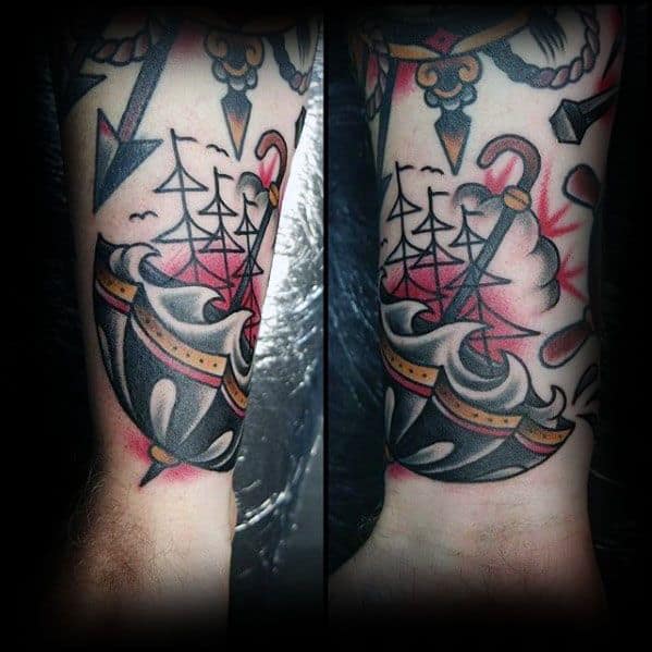 Wrist Traditional Male Umbrella Sinking Ship Tattoo Design Inspiration