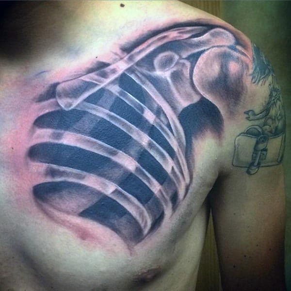 X Ray Of Bones In Mens Chest Tattoo