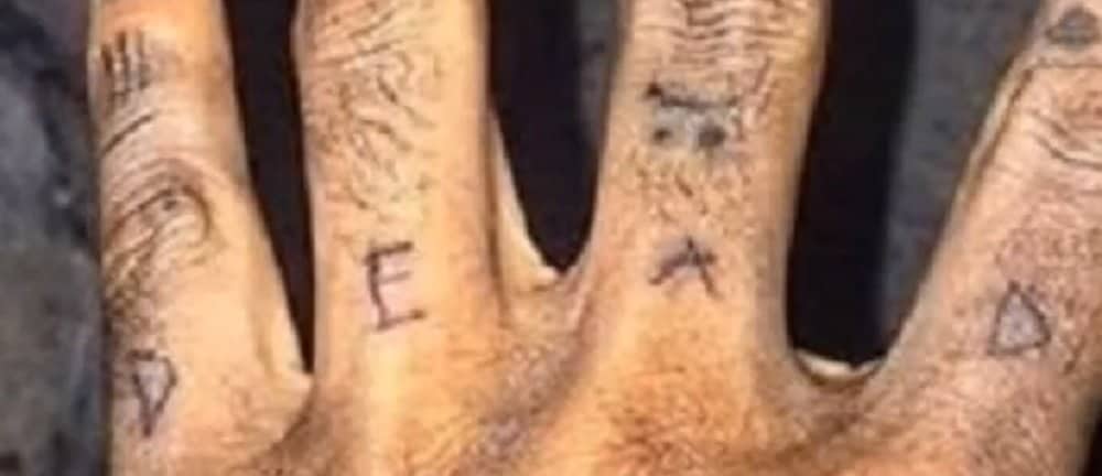 "Dead" Finger Tattoo