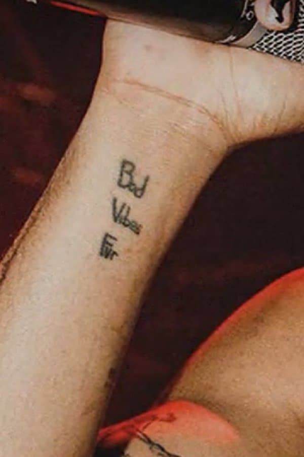"Bad Vibes Fvr" Wrist Tattoo