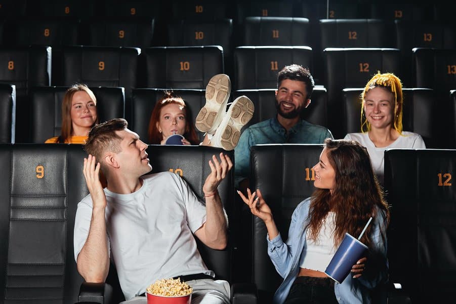 young womqan rude in movie theatre